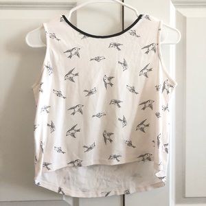 Sleeveless, muscle-tee-like top